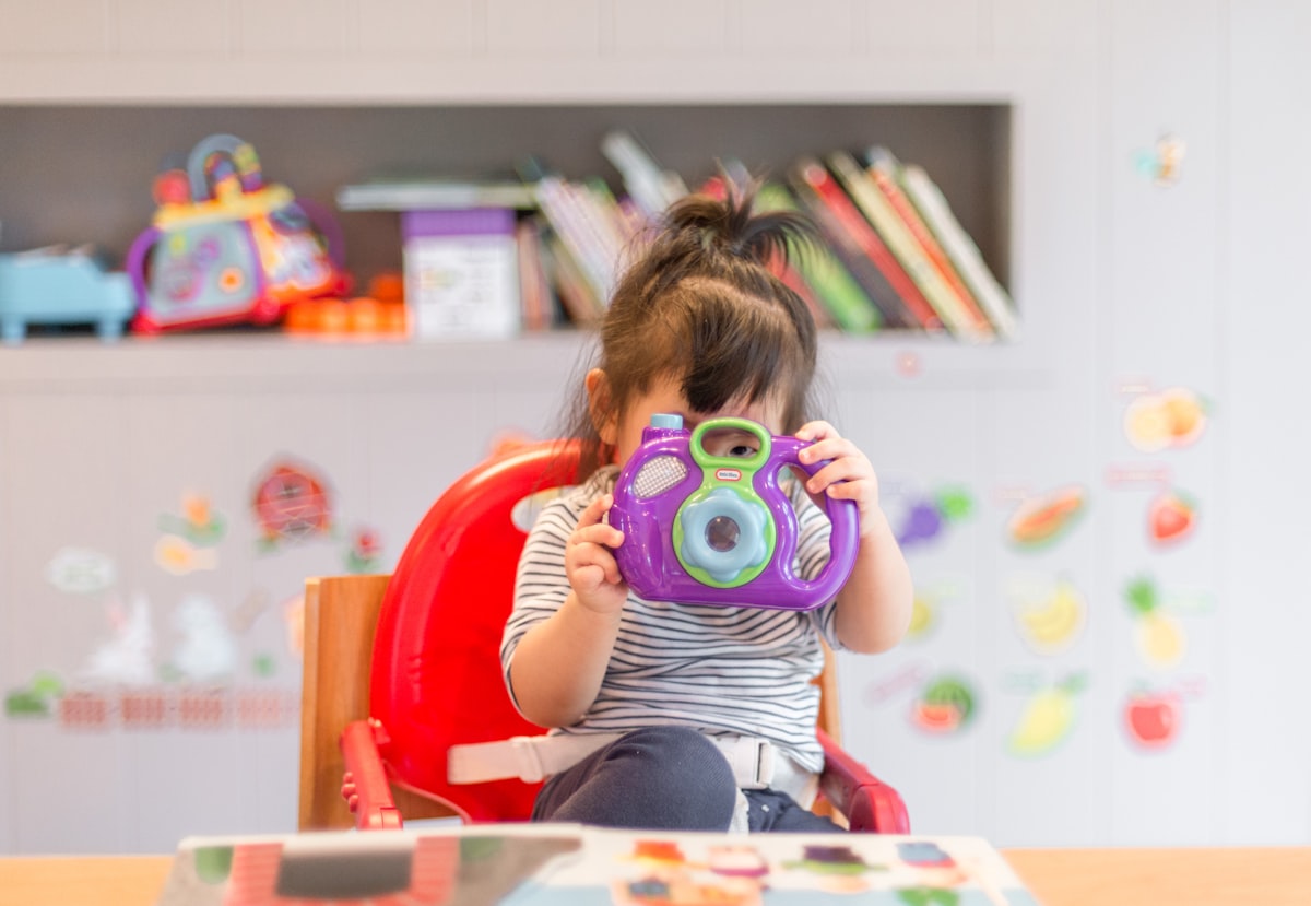 A parent and child engaged in a shared learning activity